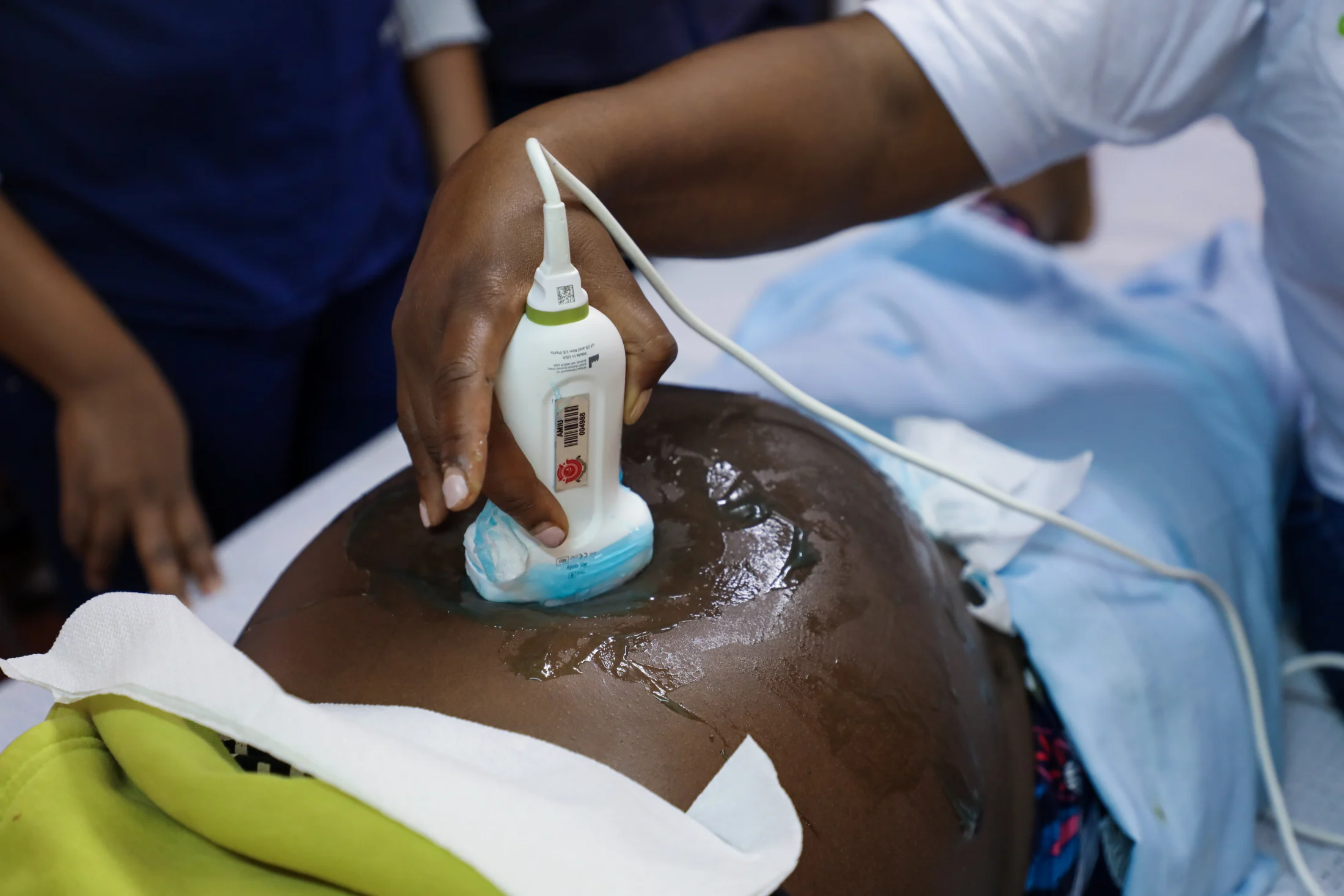Close-up of an ultrasound probe during maternal health care training